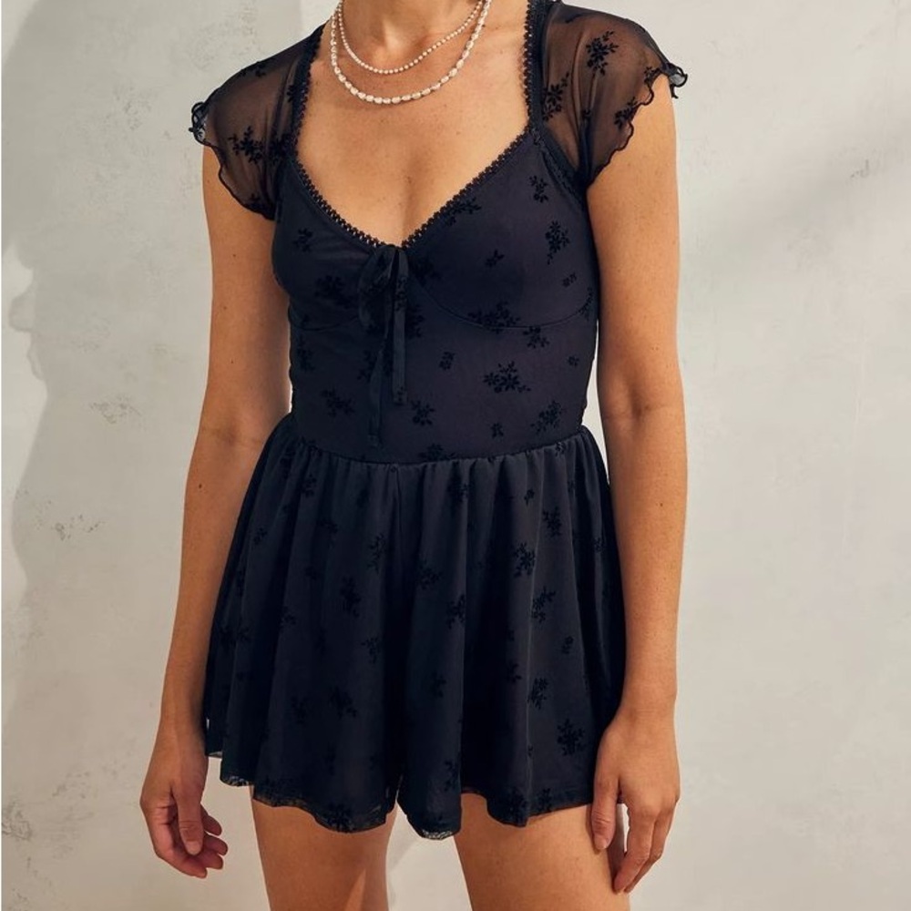 Urban outfitters “playsuit” romper dress in celestial print size M